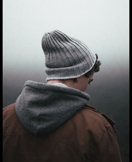 Back man's head with beanie on