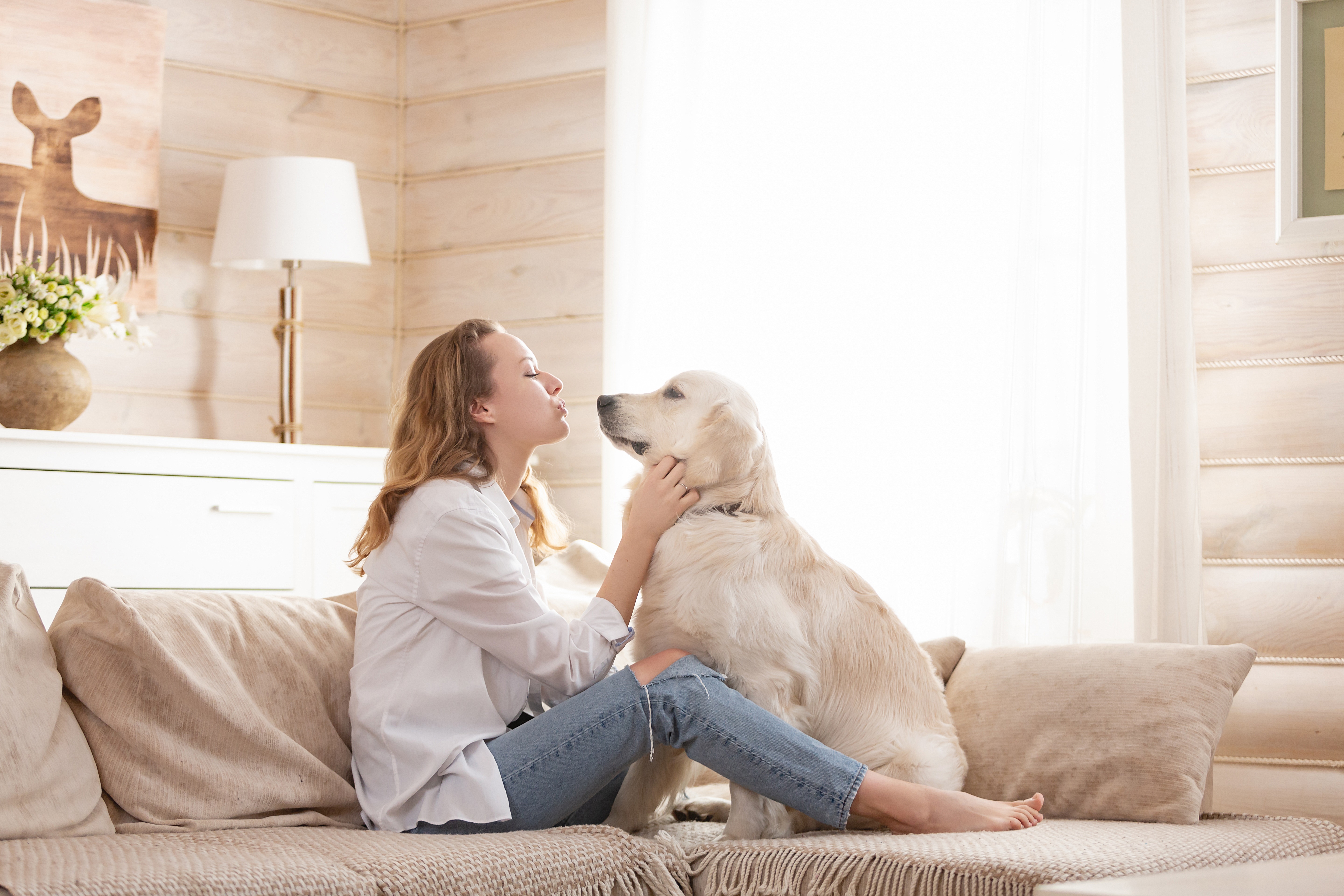 woman and her dog sitting together