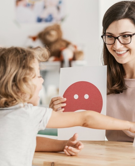 Child working with a counselor