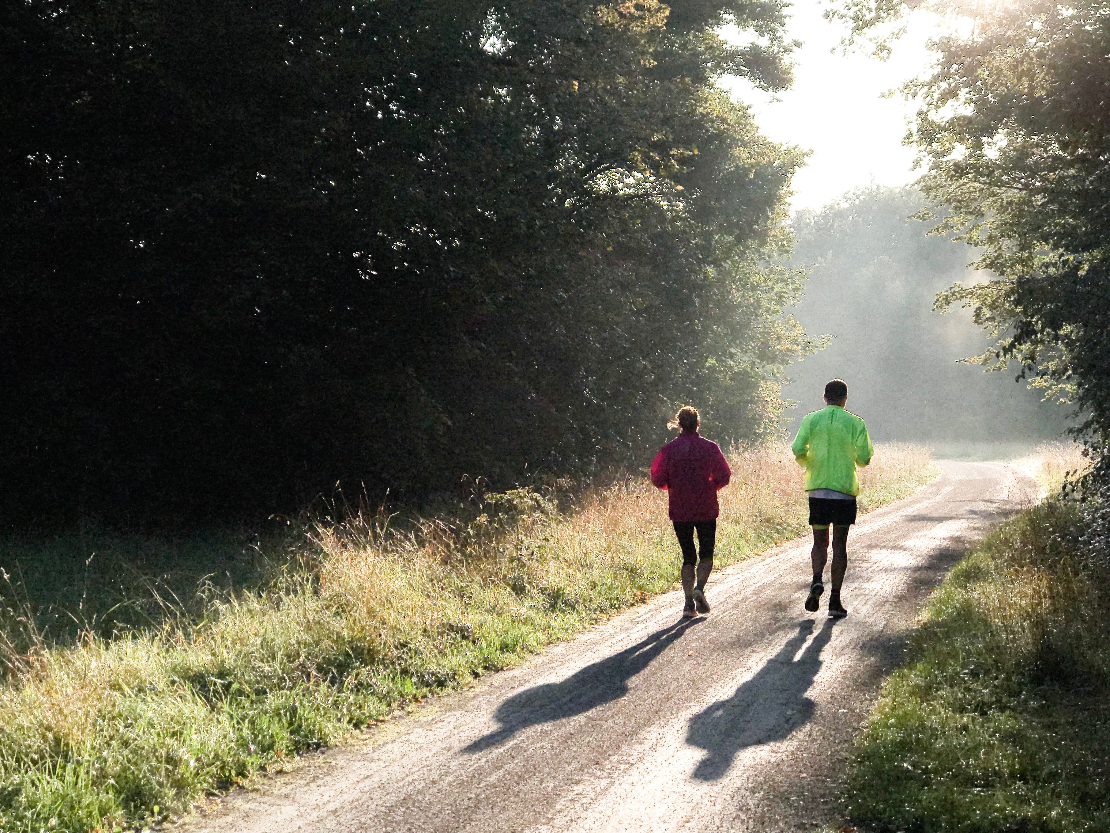 two people jogging outside